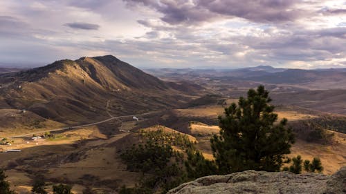 Aerial Photography of Mountains under the Cloudy Sky