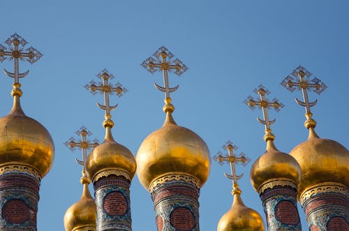 Gold-colored Mosque Towers