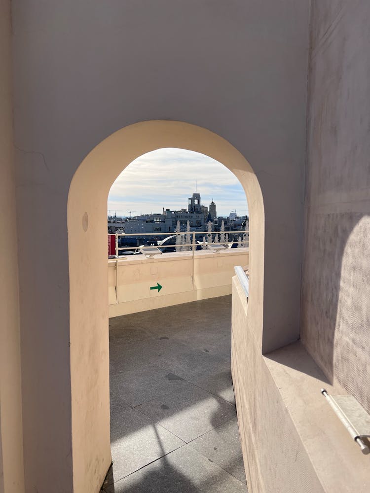 View Of A City Through An Arch 