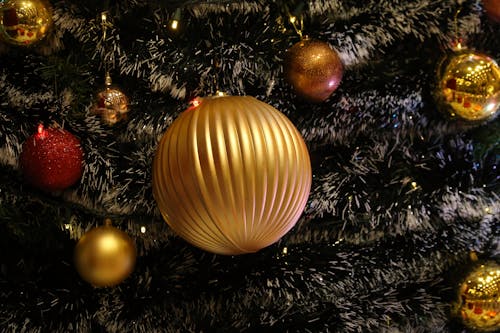 Close-Up Shot of Christmas Baubles on a Christmas Tree