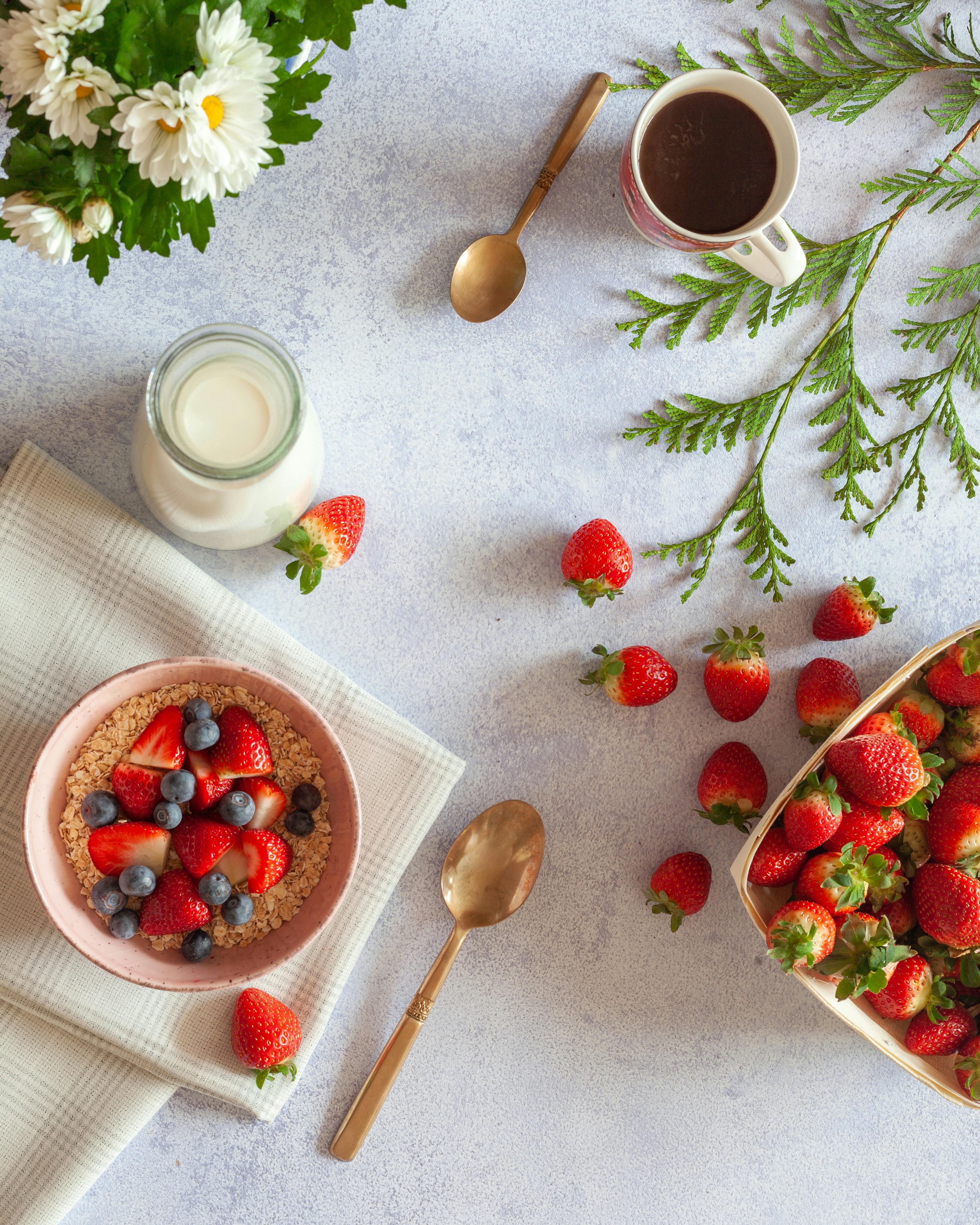 porridge and strawberries in the bowl on the table