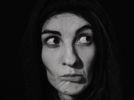 Grayscale Photo of a Person Doing Wacky Face
