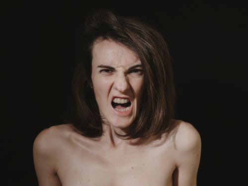 Free Portrait of a Woman Looking Furious Stock Photo