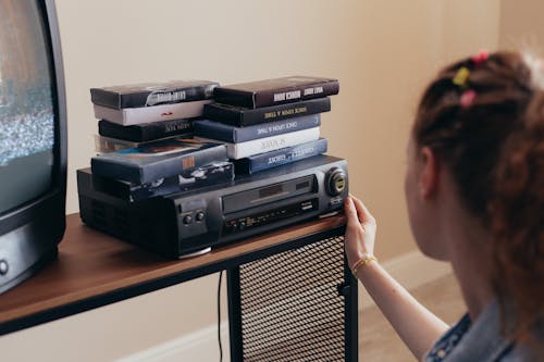 
A Woman Using a VHS