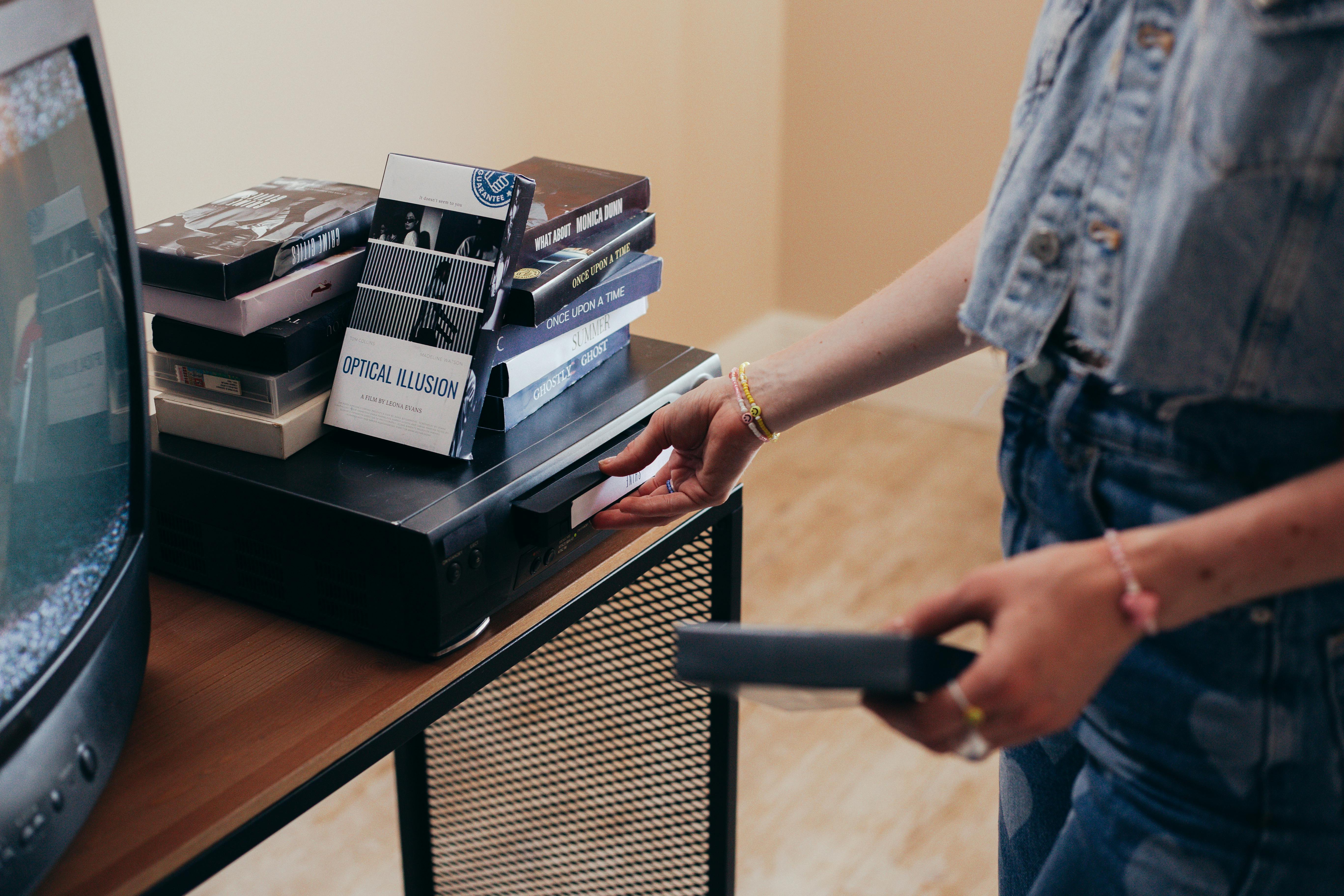 Person Holding Vhs Tape