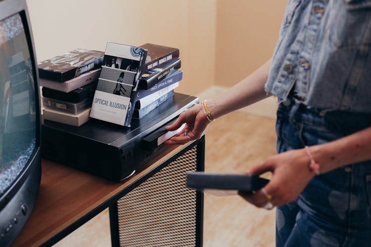 Person Holding Vhs Tape