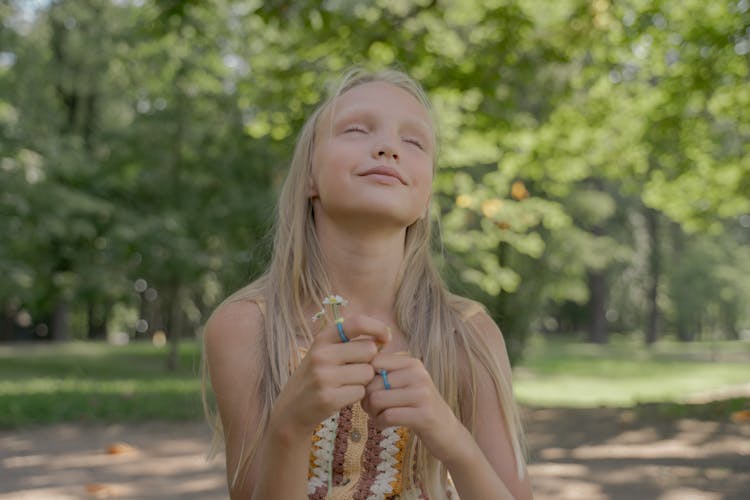 Girl Holding Flower