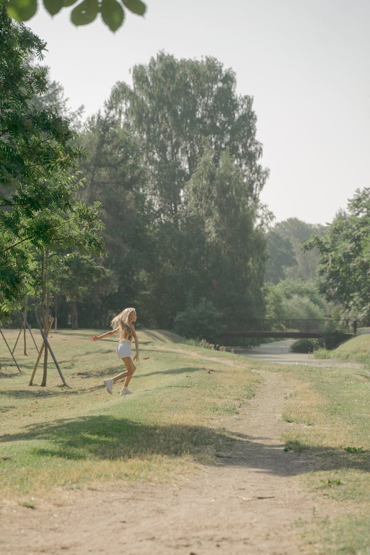 Girl Running On Path