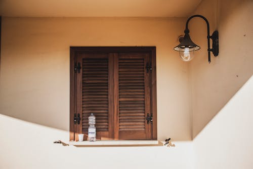 A Window with Wooden Shutters