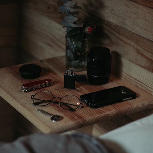 Free Black Portable Speaker on Brown Wooden Table Stock Photo