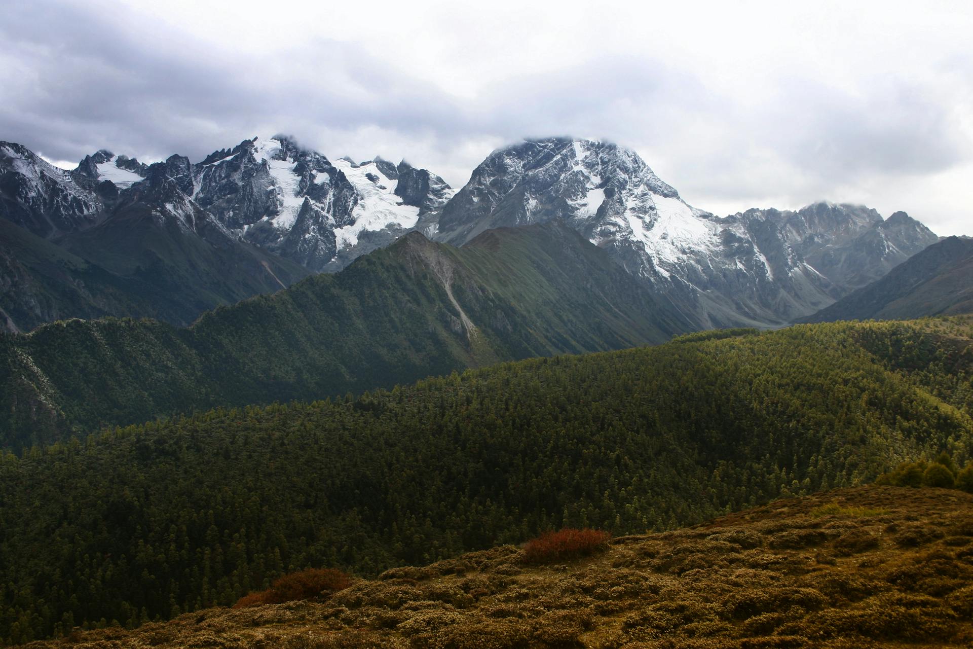 Breathtaking mountain landscape with snow-covered peaks in Yunnan, China.