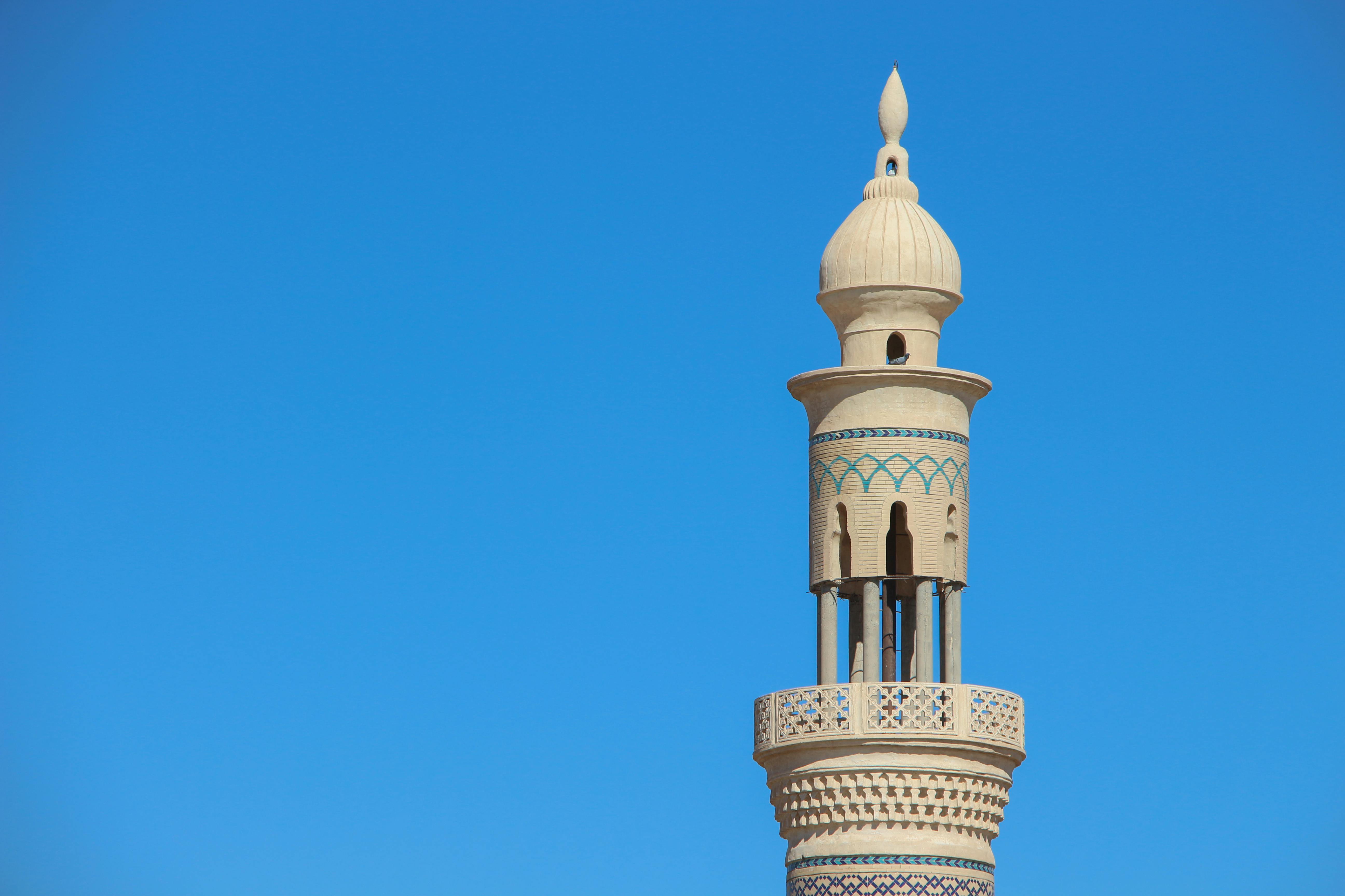 grand mosque under blue sky