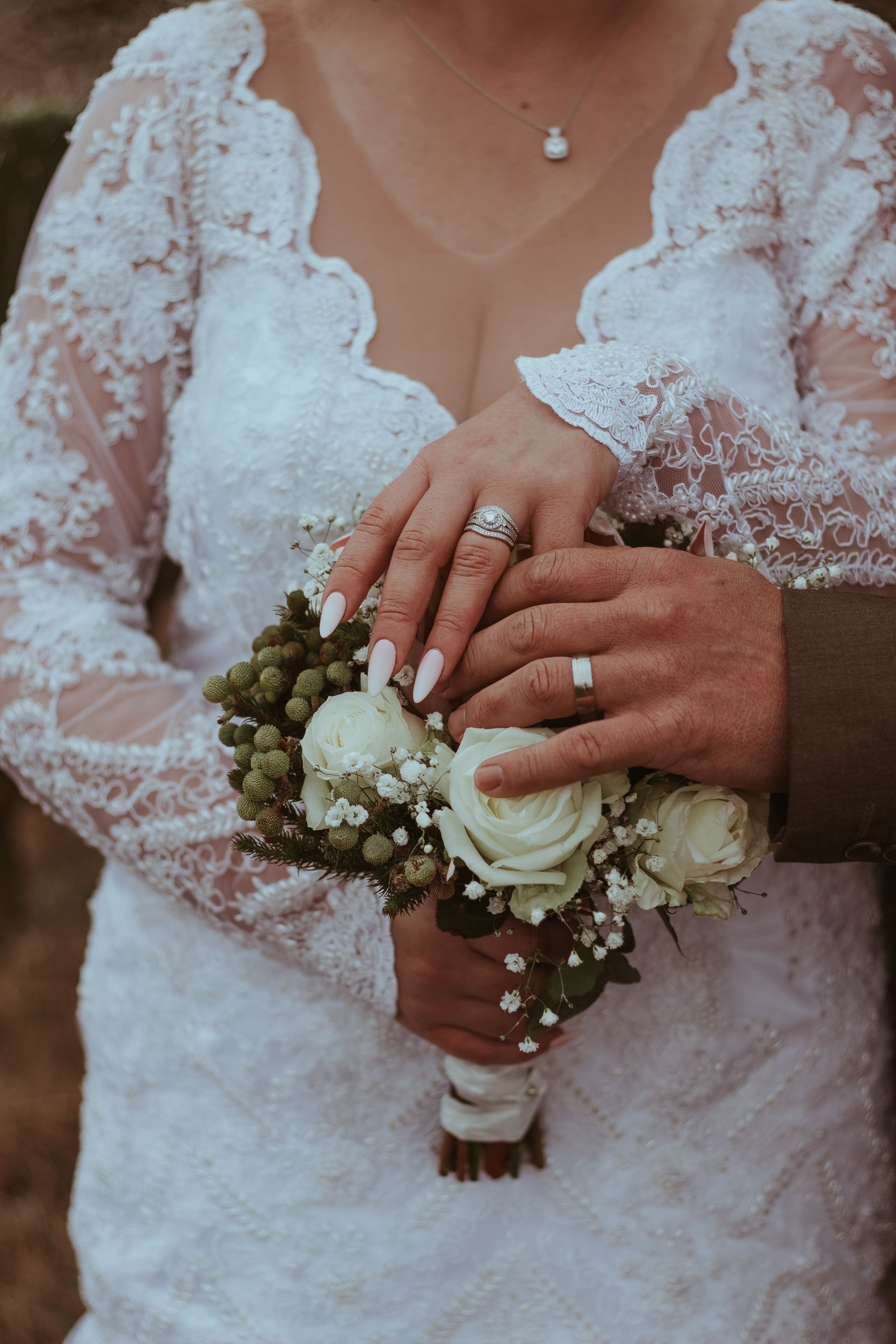 Bride in White Wedding Dress Holding Bouquet of Flowers · Free Stock Photo