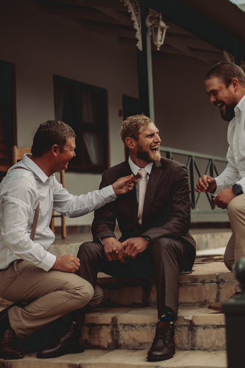 Three Elegant Happy Laughing Men
