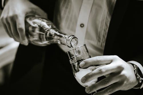 Close-up View of Pouring Champagne