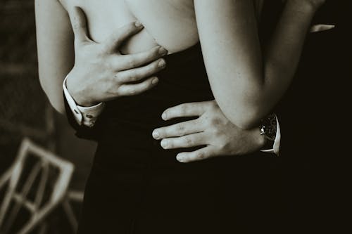 Close-up View of Man Holding Woman