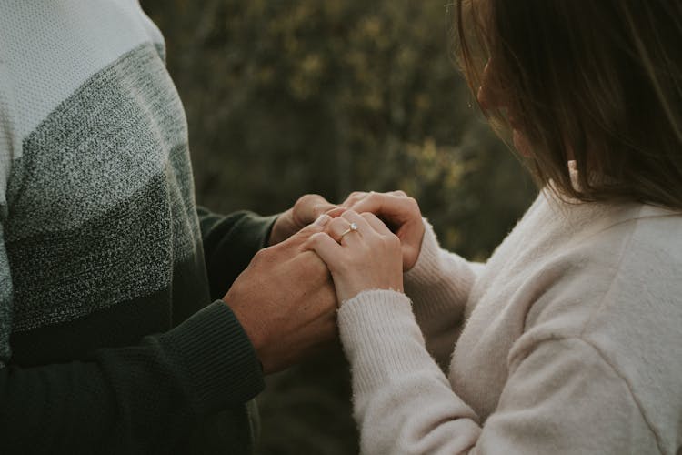 Engaged Woman Holding Hands With Her Fiance