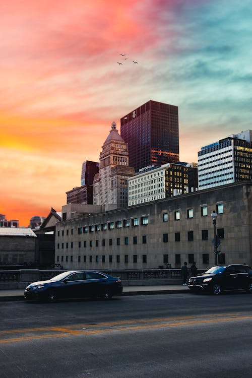 Sunset over Buildings and Street in City