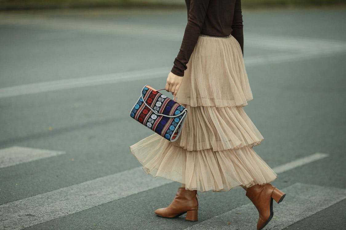 Person in Brown Skirt Crossing the Street · Free Stock Photo