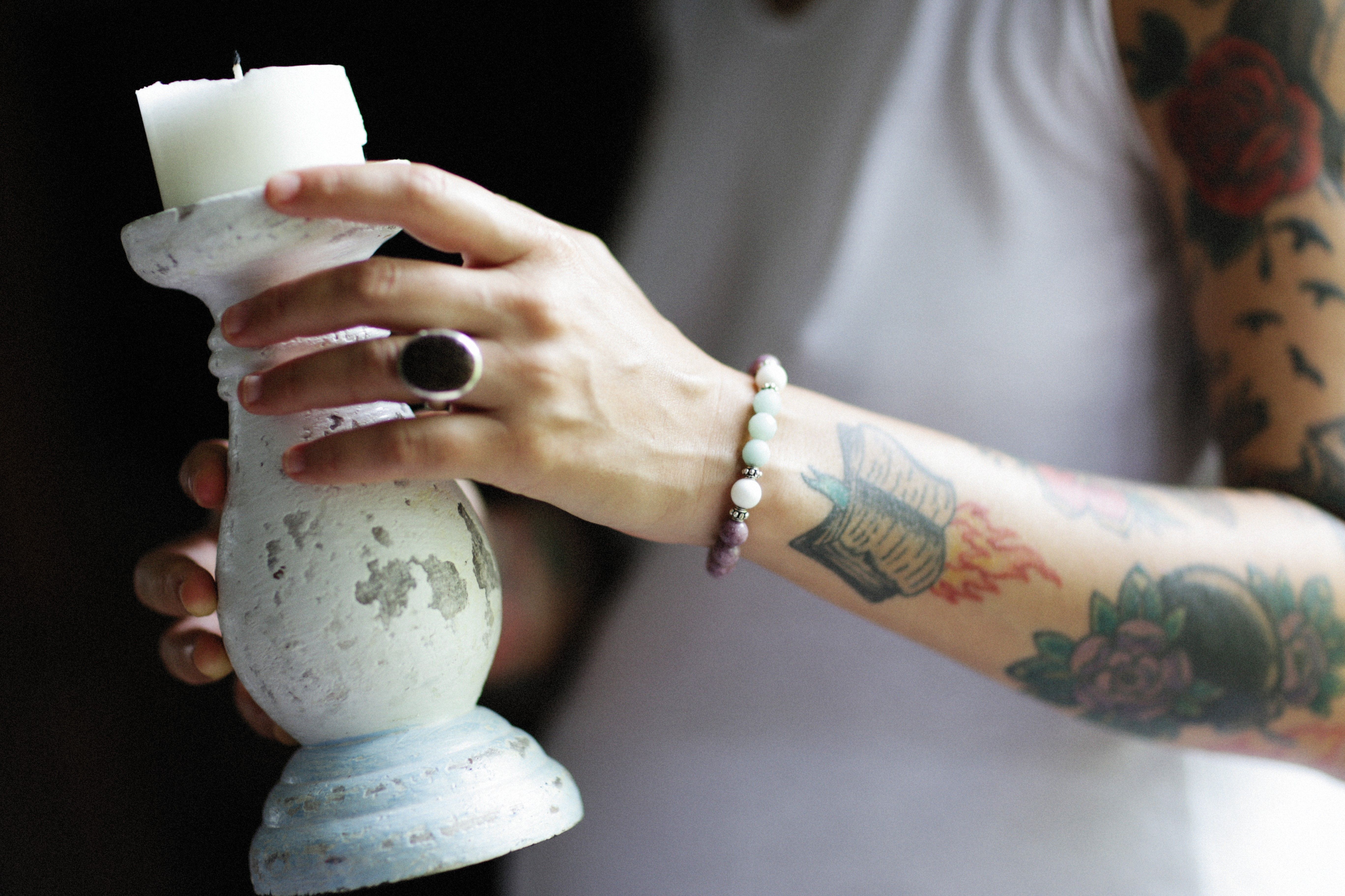 Person Holding a White Candle Holder · Free Stock Photo