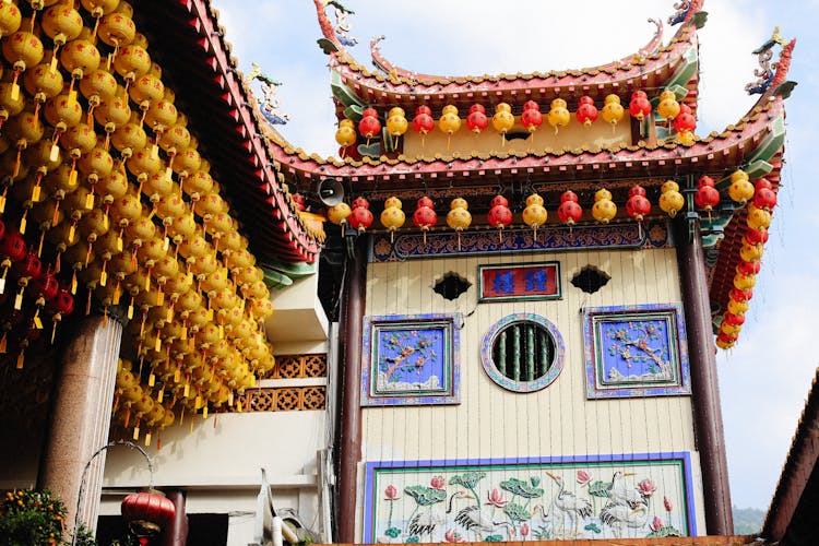 Facade Of A Chinese Pagoda With Decorative Lanterns 