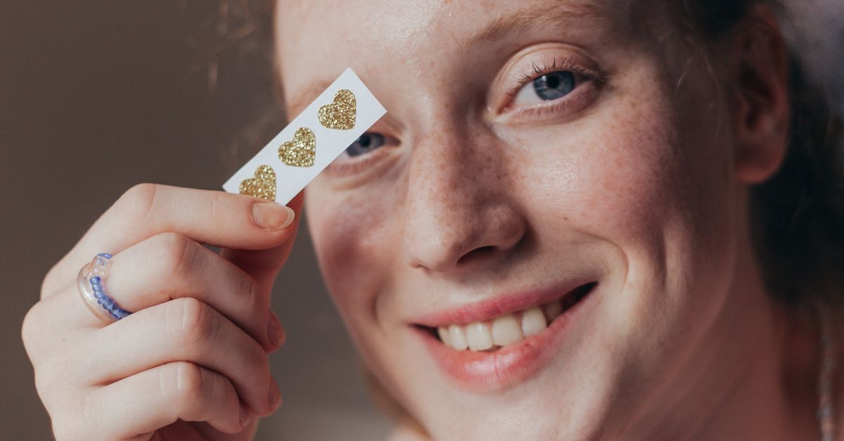 People Using Stickers Smiling Woman Holding Stickers · Free Stock Photo