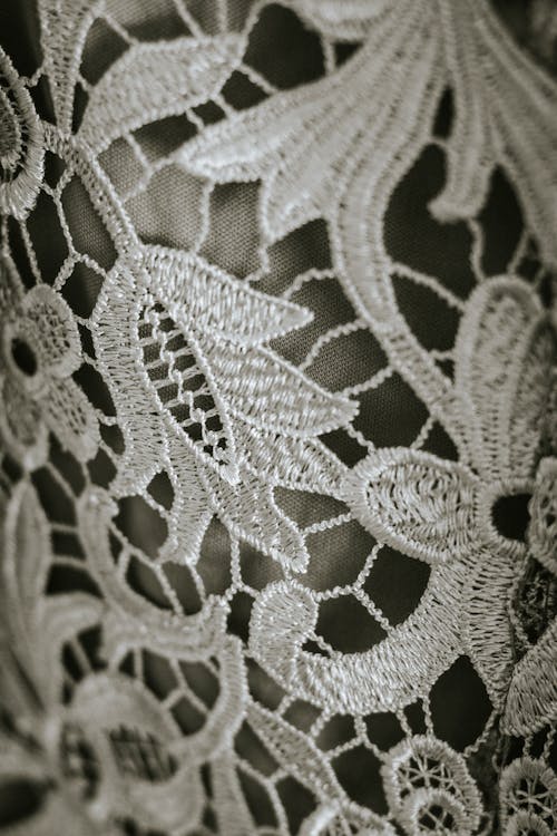 Close-Up Shot of White Floral Textile