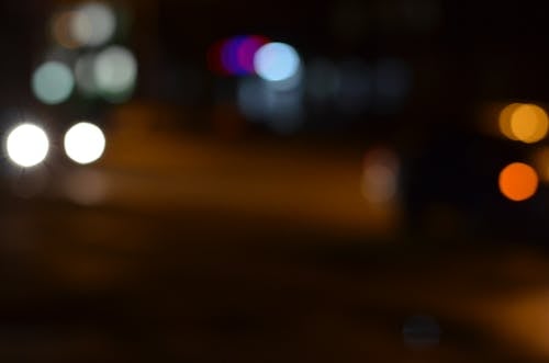 Bokeh Effect on the Lights of Cars on the Street