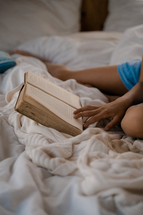 Close Up of Book Read by Child