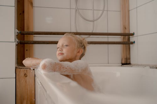 Free Child Having Bubble Bath Stock Photo