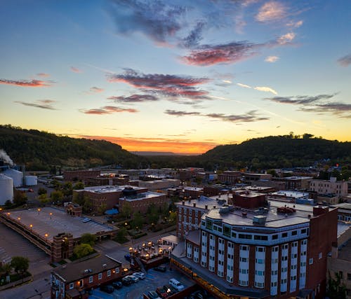 Aerial View of City Buildings during Sunset