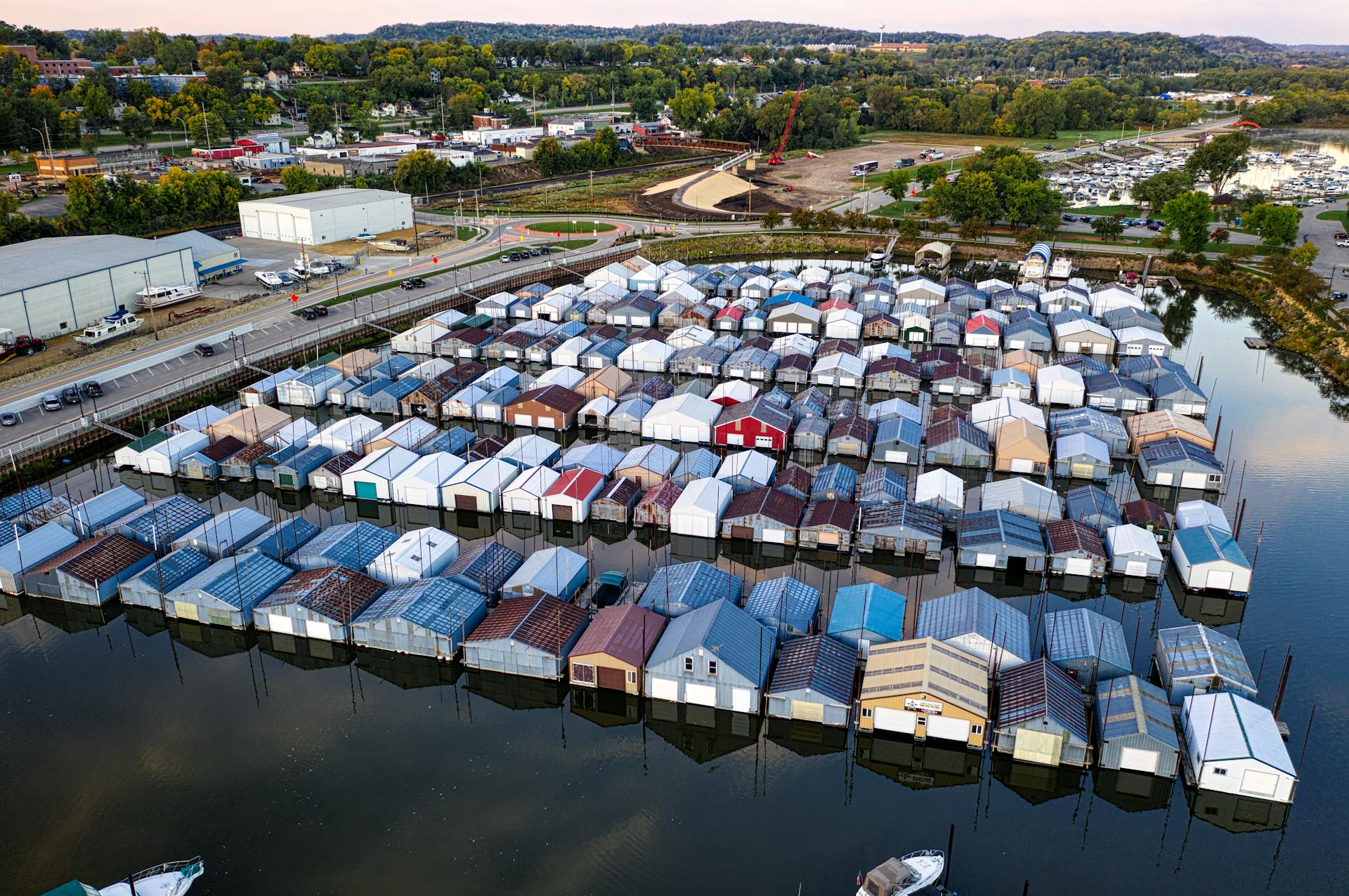 Aerial view of a marina with houseboats on a calm lake in Red Wing, Minnesota.