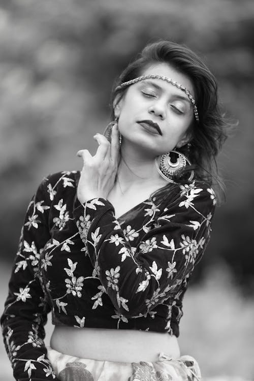 Free Monochrome Photo of a Woman Posing with Her Eyes Closed Stock Photo