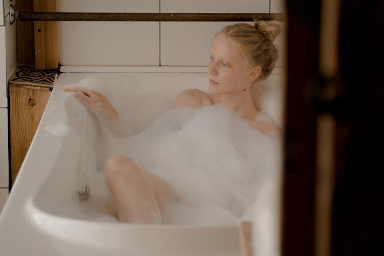 Woman In Bathtub Taking Bath