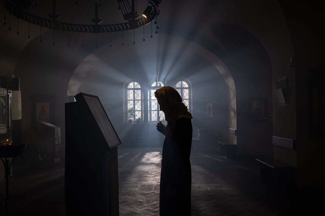Woman Praying in Orthodox Church · Free Stock Photo