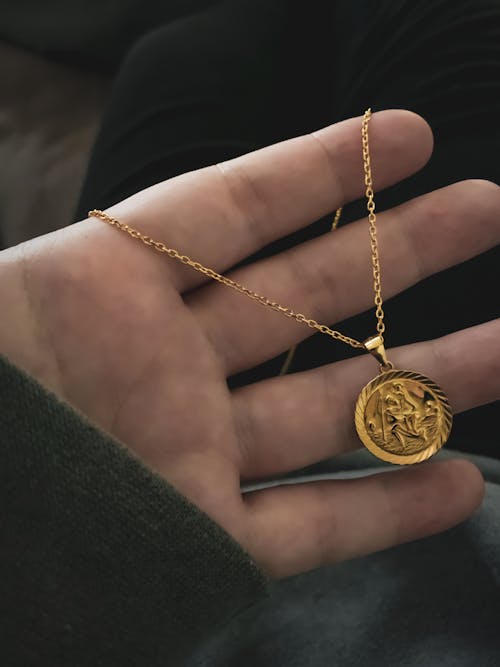 Free stock photo of gold, necklace, st christopher
