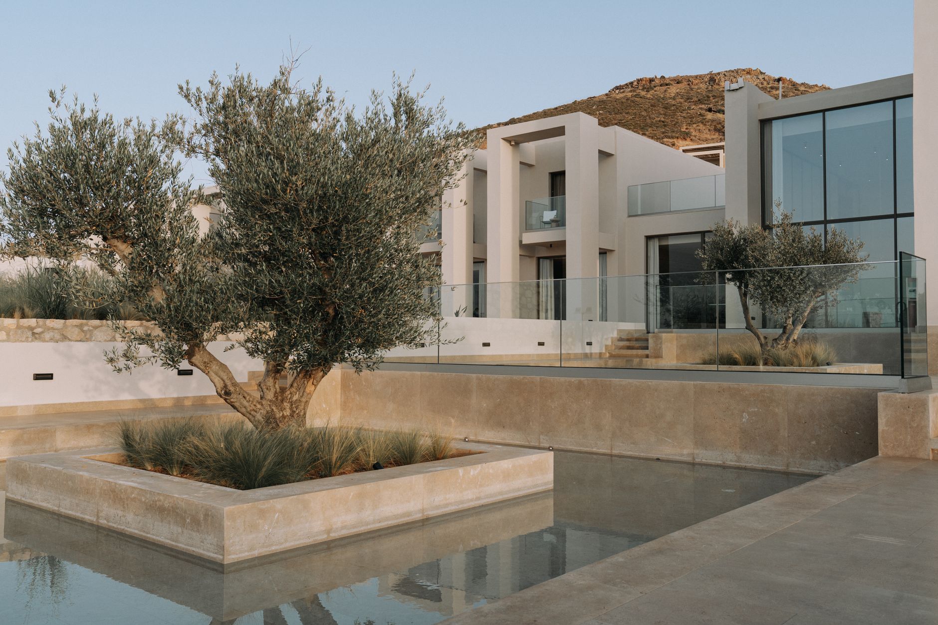 A serene and minimalist architectural sanctuary representing the privacy and security of global identity planning.