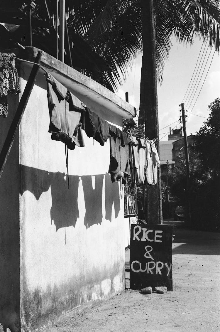 Clothes Drying By Wall