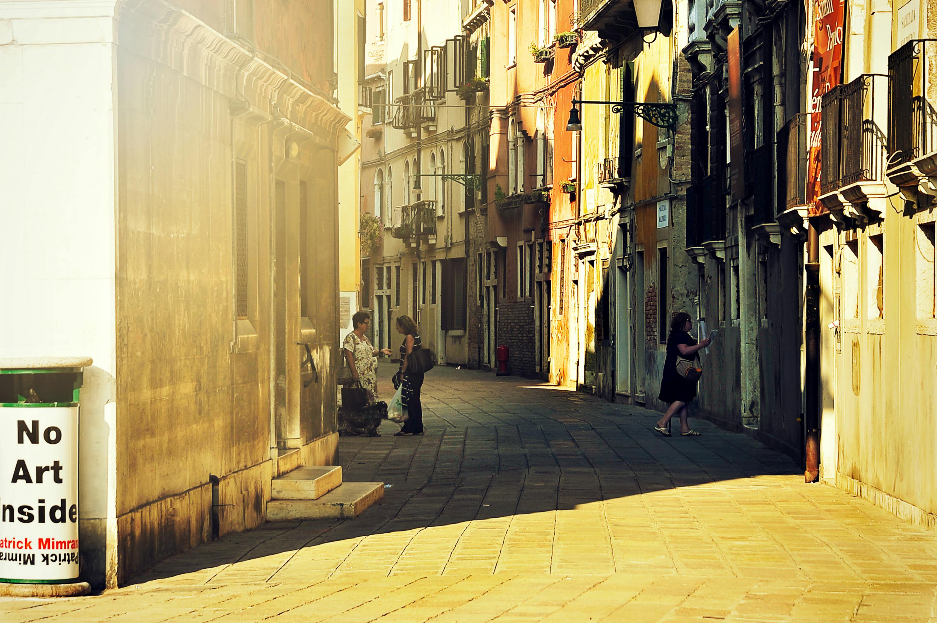 3 Person Standing In Alley Free Stock Photo