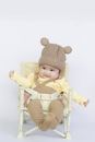 Baby in Brown and Yellow Onesie