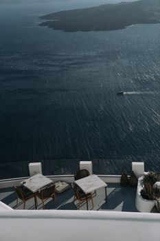 Scenic ocean view from a luxurious terrace, perfect for travel destinations.