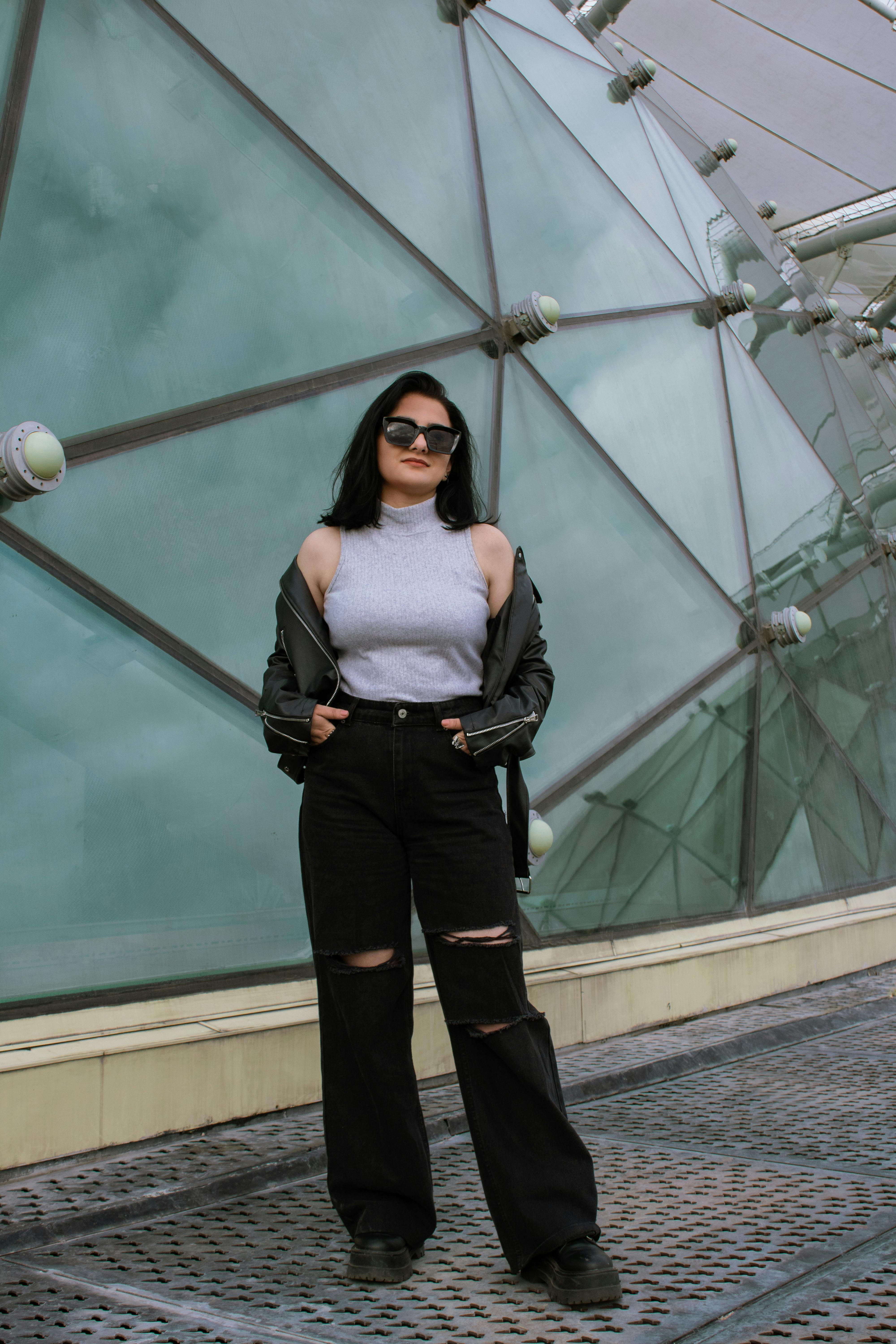 Woman in Gray Tank Top and Leather Jacket · Free Stock Photo