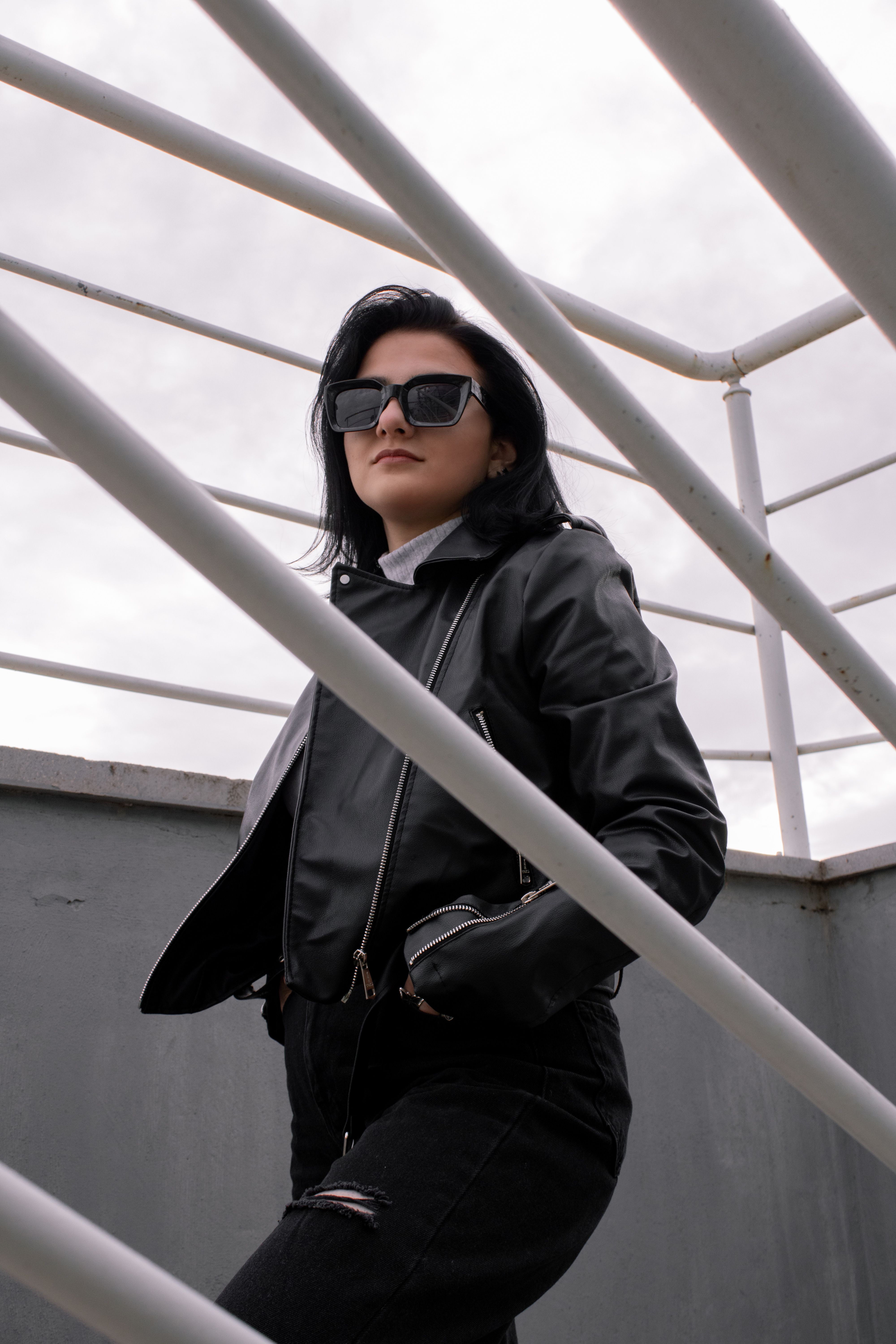 Woman in Black Leather Jacket Wearing Black Sunglasses · Free Stock Photo