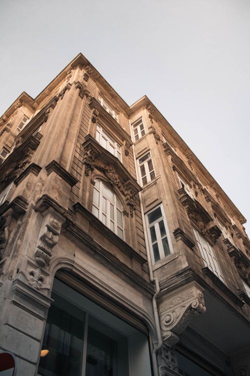 Free A detailed low-angle shot of a historical building in Istanbul, showcasing intricate architectural designs. Stock Photo