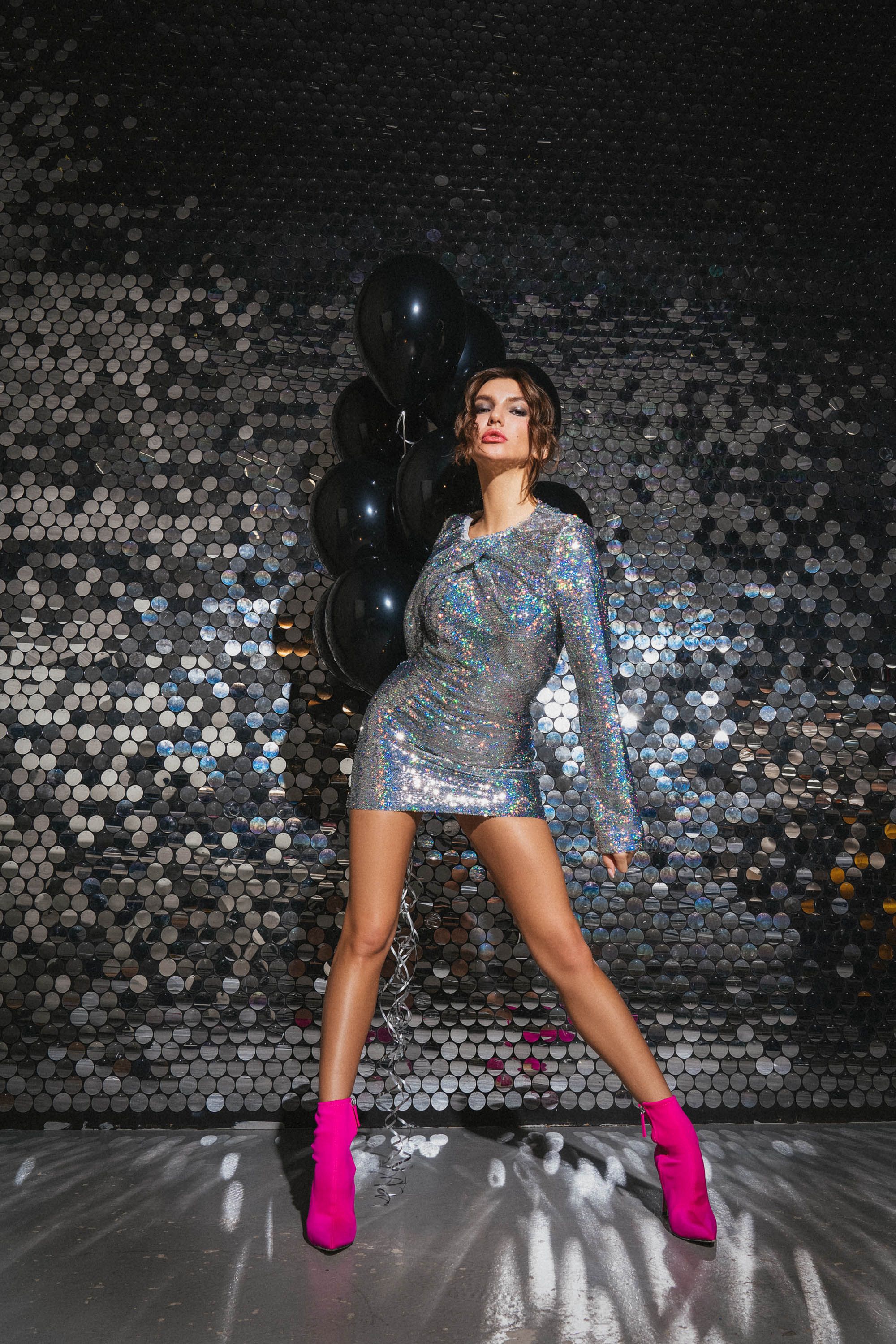 Woman wearing a sequin mini dress at a party