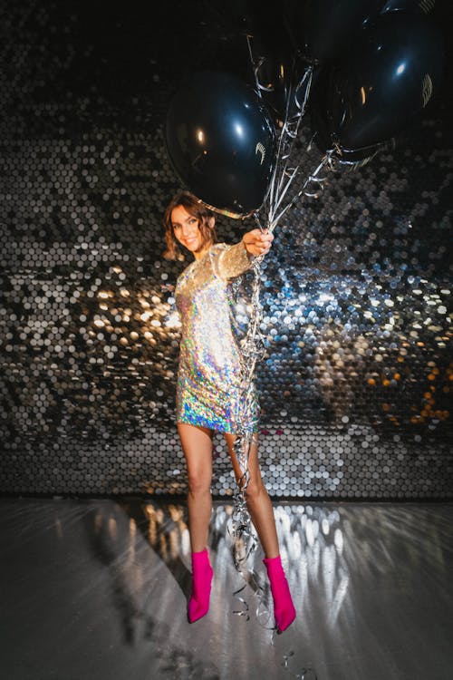 Kostnadsfri bild av ballonger, håller, kvinna