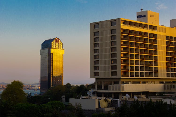 View Of Modern Hotels Lit By Sunset Light