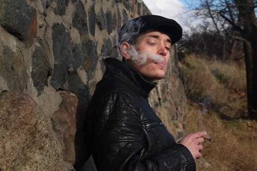 A Man Smoking Marijuana