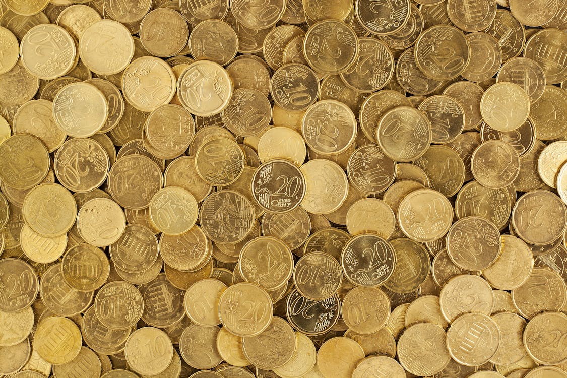 бесплатная Куча золотых круглых монет Стоковое фото