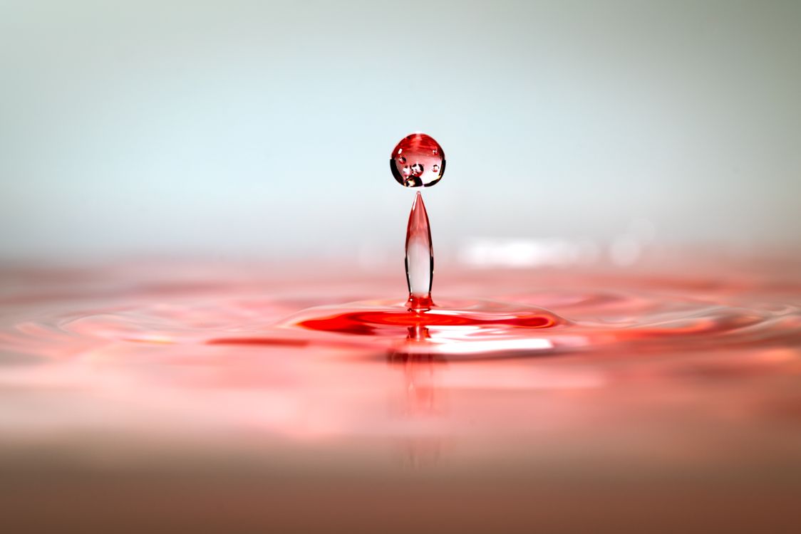 Red Dropplets Red Water Droplet Creating Ripples · Free Stock Photo